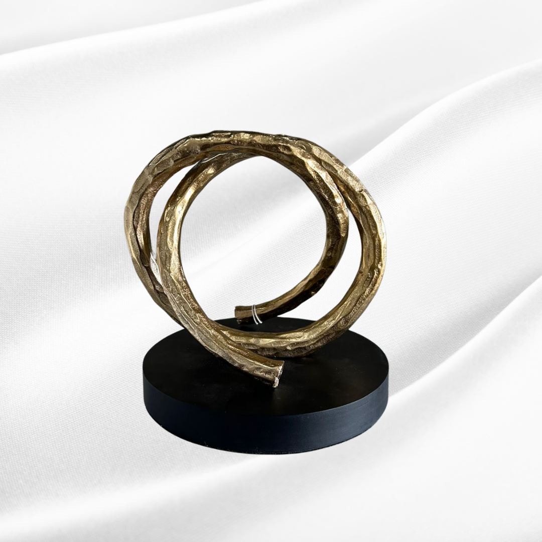 Gold ring on stand