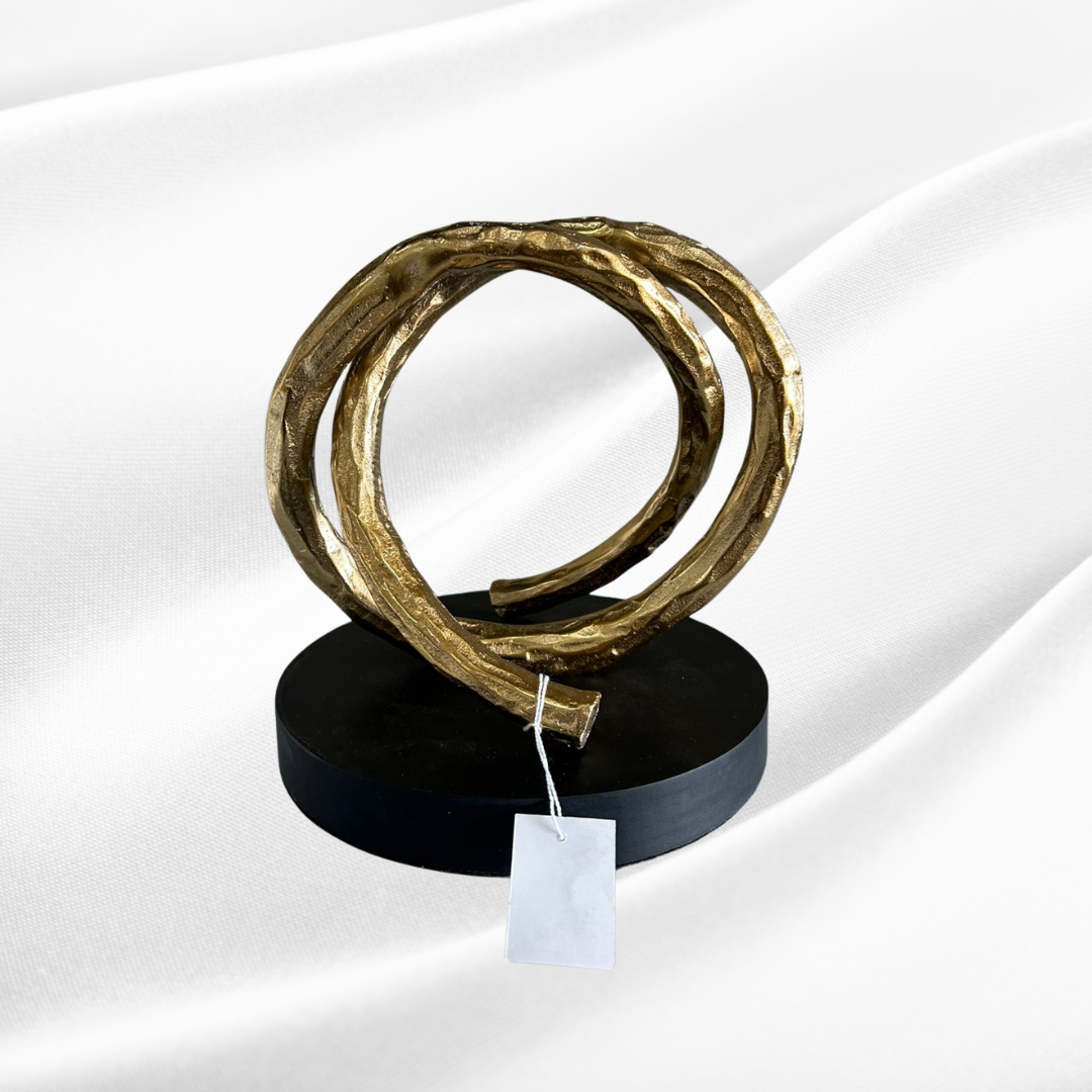 Gold ring on stand
